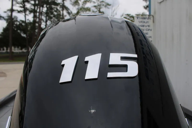 Slide: The Image of Close-up of 115 horsepower engine on 2025 G3 Sportsman 1810 boat. - 18
