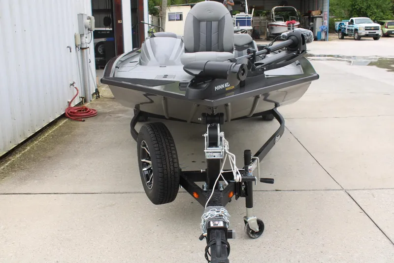 Slide: The Image of 2025 G3 Sportsman 1810 boat on trailer, parked outdoors near a building. - 3