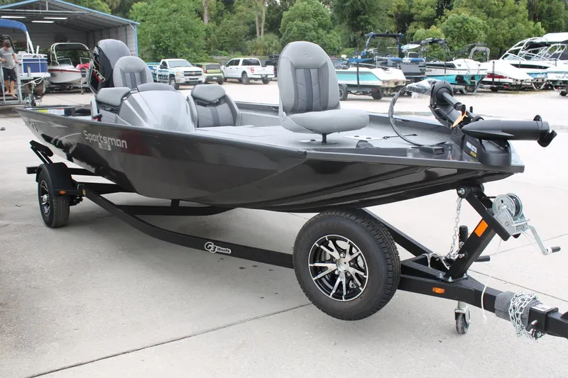 Slide: The Image of 2025 G3 Sportsman 1810 boat on trailer, parked outdoors. - 4