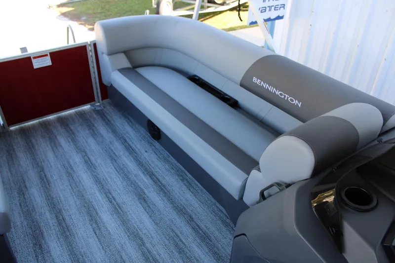 Slide: The Image of 2025 Bennington 20S pontoon boat interior with gray seating and modern design. - 13