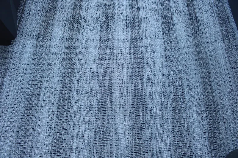 Slide: The Image of Textured flooring of a 2025 Bennington 20S boat, featuring a woven pattern. - 14