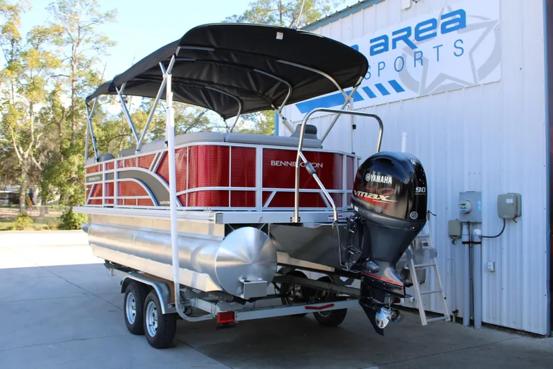 Slide: The Image of 2025 Bennington 20S pontoon boat with Yamaha VMAX engine on trailer. - 5