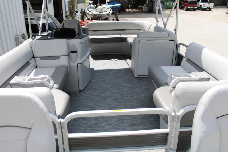 Slide: The Image of 2023 Godfrey Sweetwater 2286 BF pontoon boat interior with spacious seating and modern design. - 10