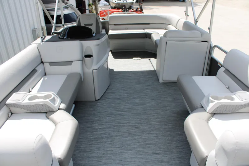 Slide: The Image of 2023 Godfrey Sweetwater 2286 BF pontoon boat interior with spacious seating and modern design. - 12