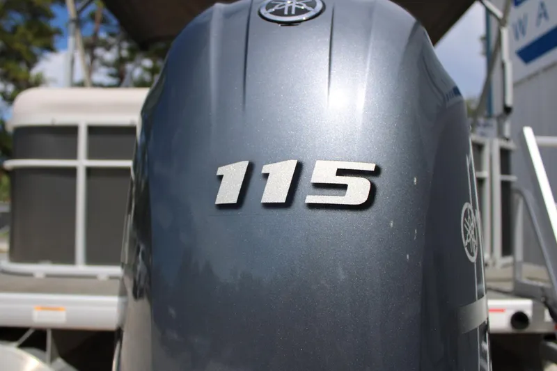 Slide: The Image of Outboard motor with "115" on a 2023 Godfrey Sweetwater 2286 BF boat. - 7