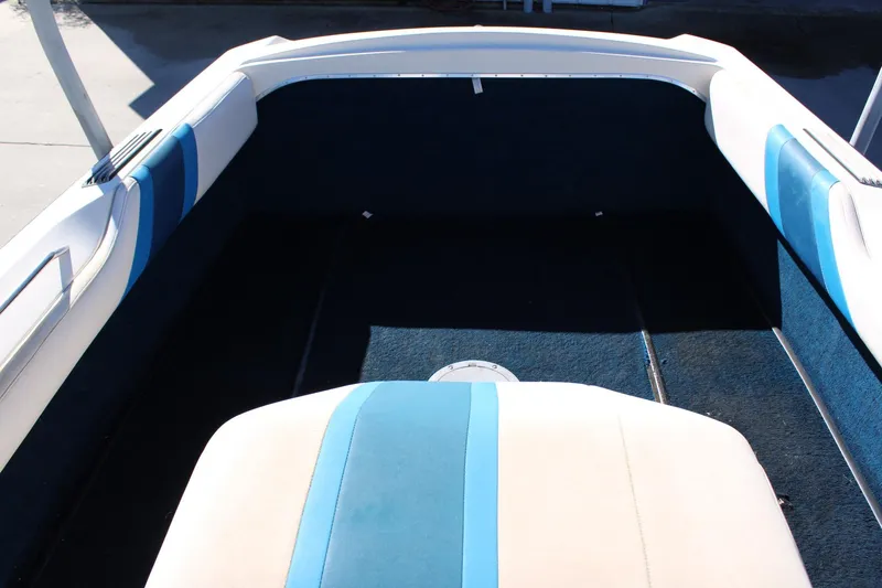 Slide: The Image of 1985 Correct Craft Ski Nautique interior with blue and white upholstery. - 8