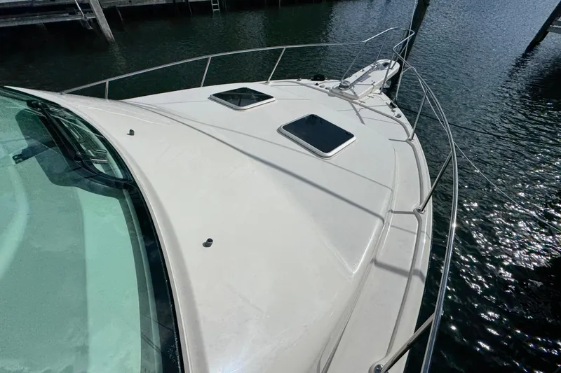 Slide: The Image of 2016 Grady-White Express 370 boat deck with railings and water view. - 18