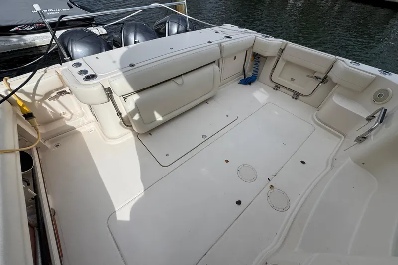 Slide: The Image of 2016 Grady-White Express 370 boat deck with seating and storage compartments. - 5