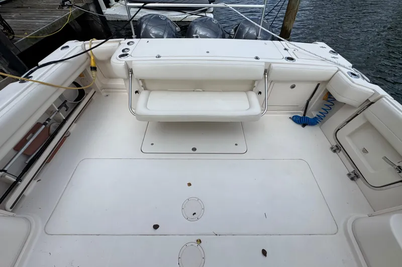 Slide: The Image of 2016 Grady-White Express 370 boat deck with seating and outboard motors. - 6