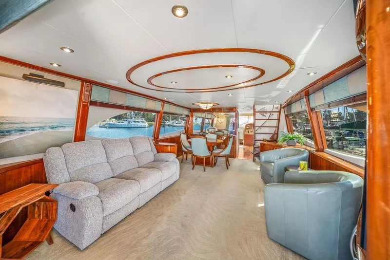 Slide: The Image of Luxurious interior of a 2007 Lazzara 68 yacht with elegant seating and large windows. - 12