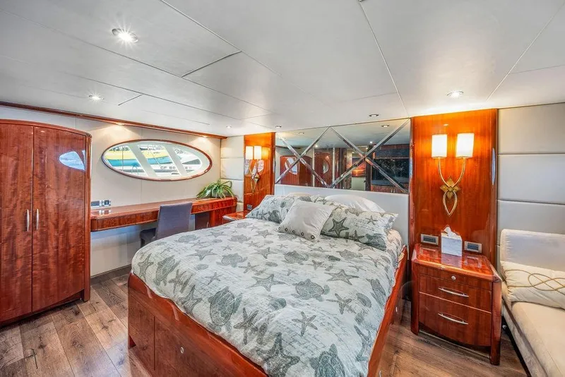 Slide: The Image of Luxurious bedroom interior of 2007 Lazzara 68 yacht with elegant wood finishes and modern decor. - 33