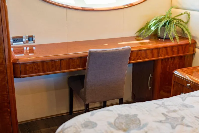 Slide: The Image of Luxurious wooden desk and chair in 2007 Lazzara 68 yacht interior. - 35