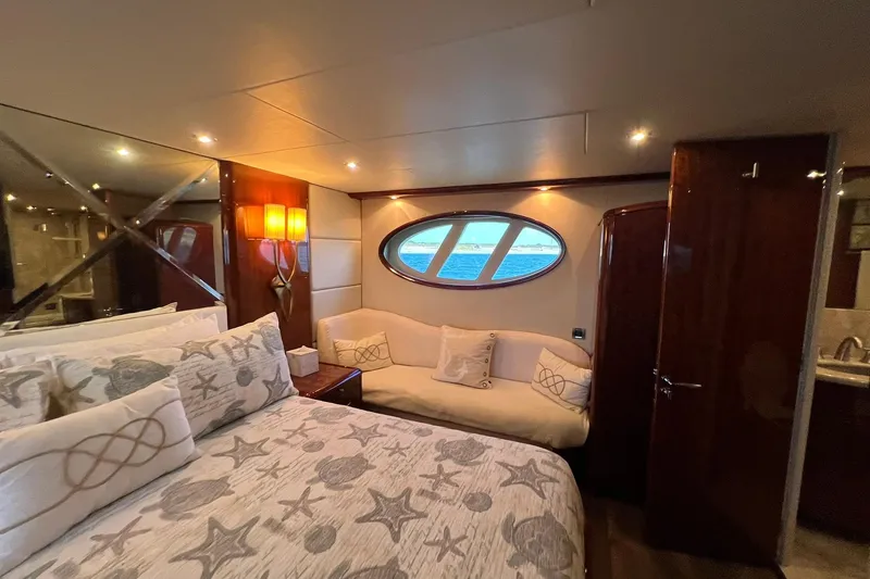 Slide: The Image of Luxurious bedroom interior of 2007 Lazzara 68 yacht with ocean view window. - 38
