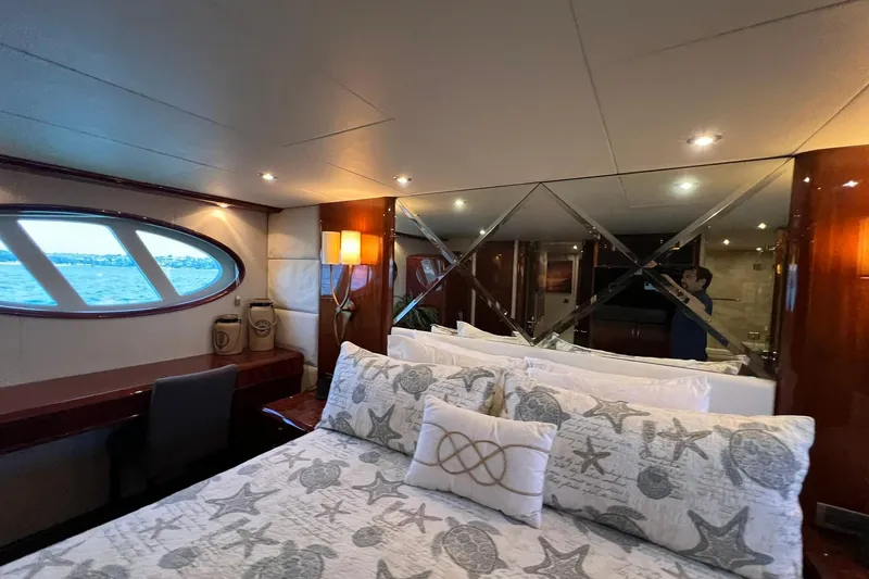 Slide: The Image of Luxurious bedroom interior of 2007 Lazzara 68 yacht with ocean view window. - 40