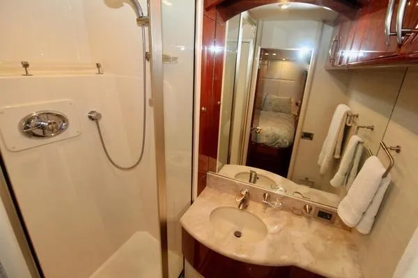Slide: The Image of Luxurious bathroom in 2007 Lazzara 68 yacht with elegant fixtures and shower. - 43