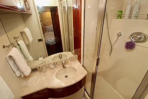 Slide: The Image of Luxurious bathroom in 2007 Lazzara 68 yacht with modern fixtures and elegant design. - 44