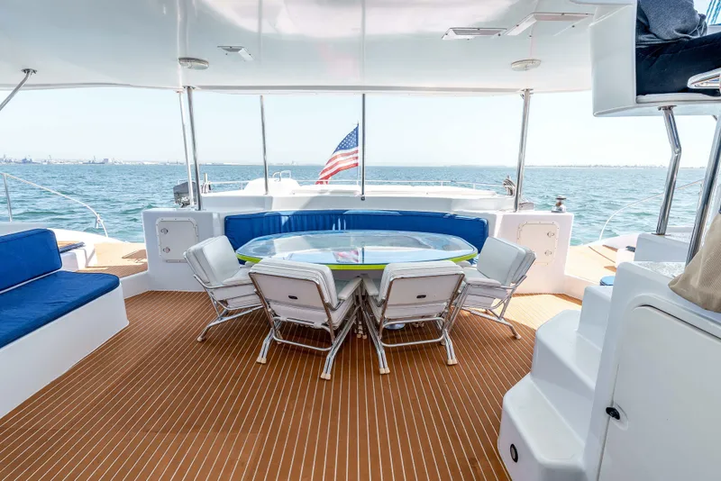 Slide: The Image of Spacious deck of 2009 Kelsall KSS 58 yacht with seating and ocean view. - 10