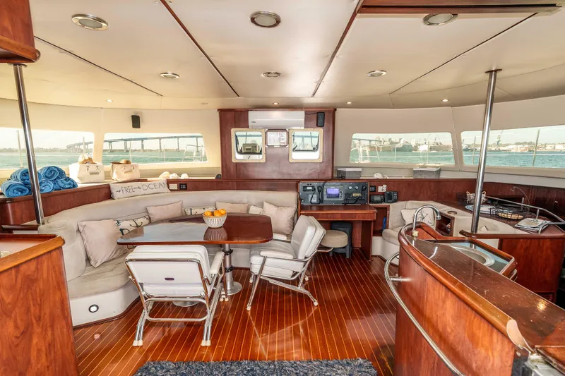 Slide: The Image of Luxurious interior of 2009 Kelsall KSS 58 yacht with elegant wood finishes and ocean view. - 15