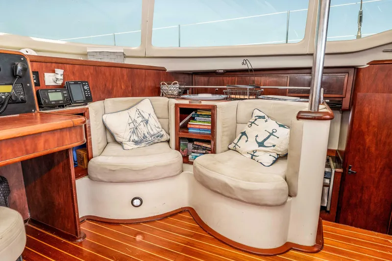 Slide: The Image of Cozy interior of 2009 Kelsall KSS 58 yacht with plush seating and nautical decor. - 19