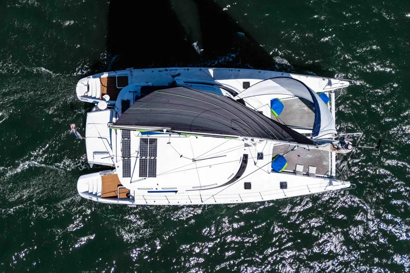 Slide: The Image of Aerial view of 2009 Kelsall KSS 58 catamaran sailing on open water. - 2