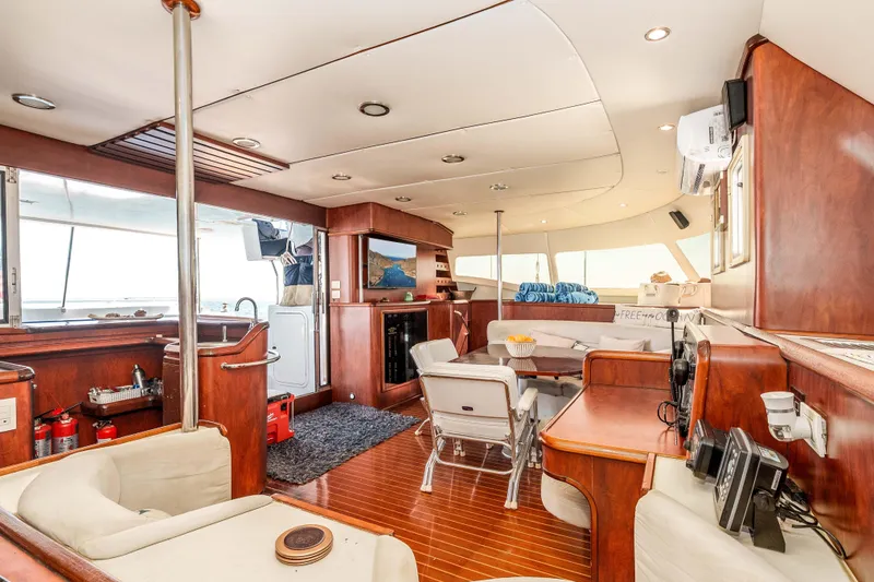 Slide: The Image of Luxurious interior of 2009 Kelsall KSS 58 yacht with elegant wood finishes and modern amenities. - 20