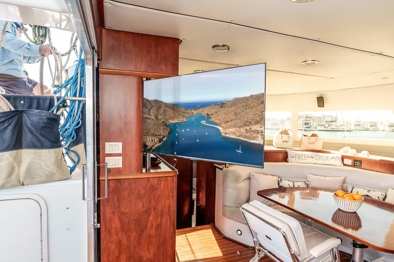 Slide: The Image of Luxurious interior of 2009 Kelsall KSS 58 yacht with TV and dining area. - 23