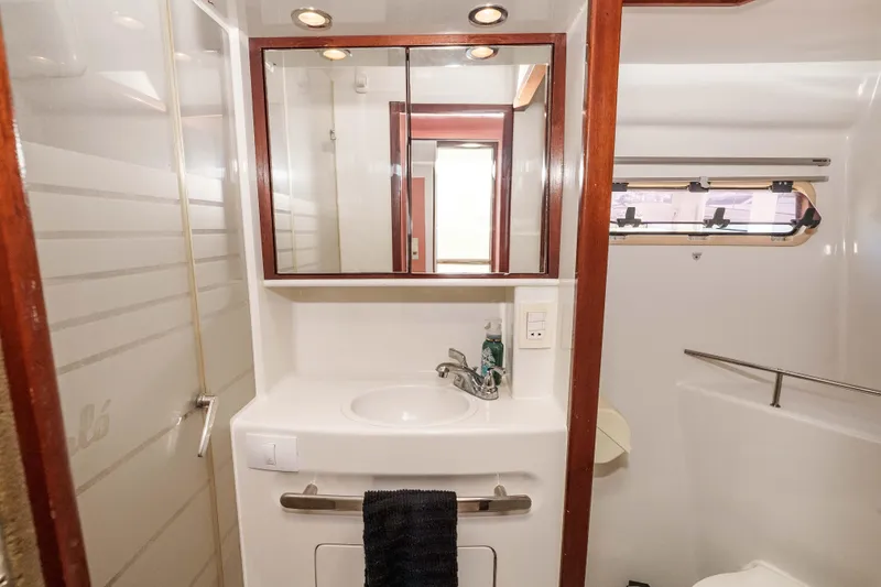 Slide: The Image of Luxurious bathroom in 2009 Kelsall KSS 58 yacht with modern fixtures and ample lighting. - 29