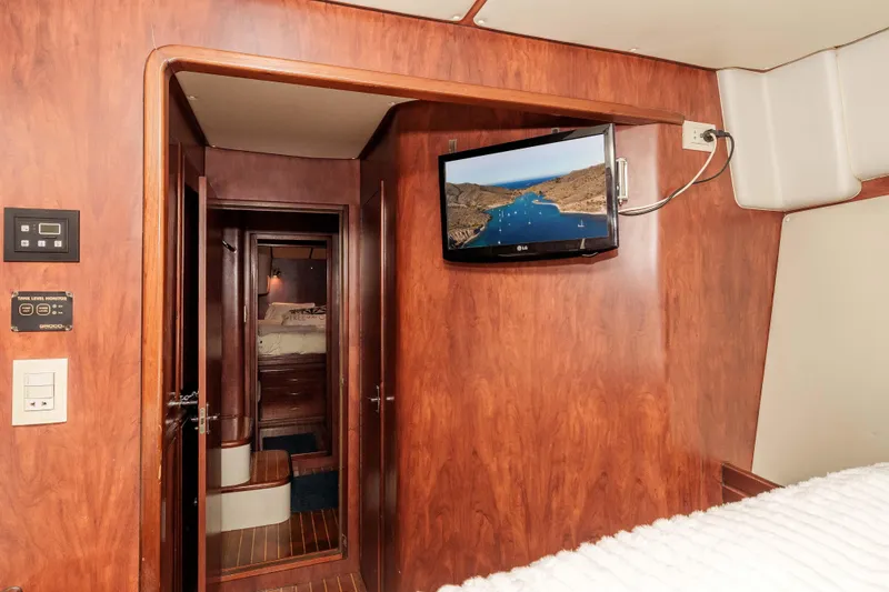Slide: The Image of Interior of 2009 Kelsall KSS 58 yacht with wood paneling and mounted TV. - 35