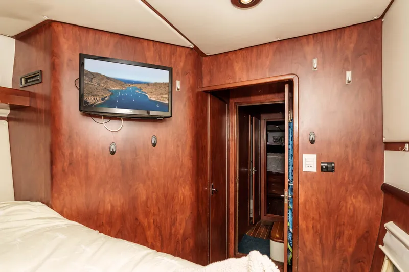 Slide: The Image of Interior of 2009 Kelsall KSS 58 yacht with wood paneling and mounted TV. - 40