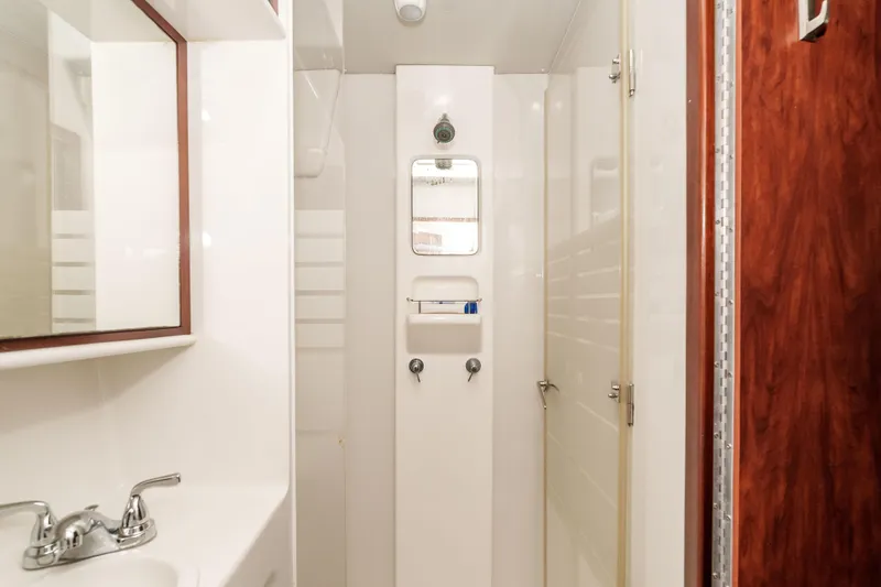 Slide: The Image of Bathroom interior of 2009 Kelsall KSS 58 yacht, featuring shower and sink. - 42