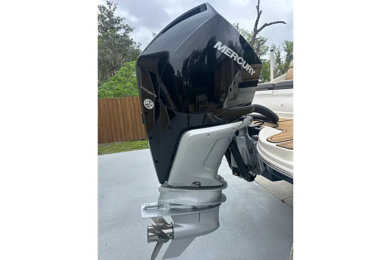 Slide: The Image of 2019 Sea Ray SDX 270 Outboard with Mercury engine, parked outdoors. - 27