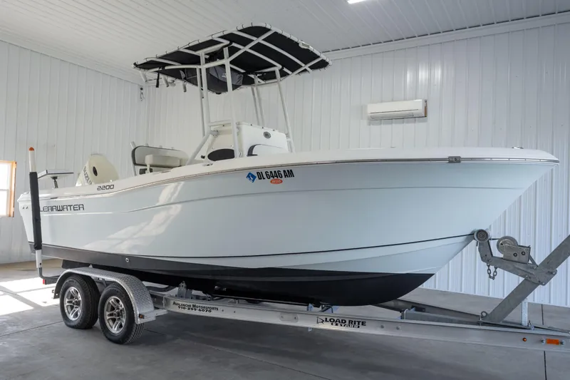 The Image of 2020 Clearwater 2200 boat on trailer in indoor storage facility. - 0