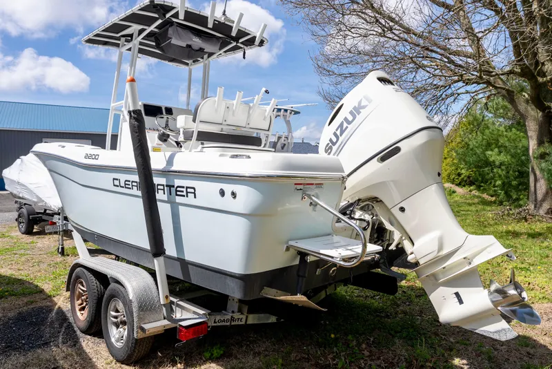 Slide: The Image of 2020 Clearwater 2200 boat console with steering wheel and navigation controls. - 4