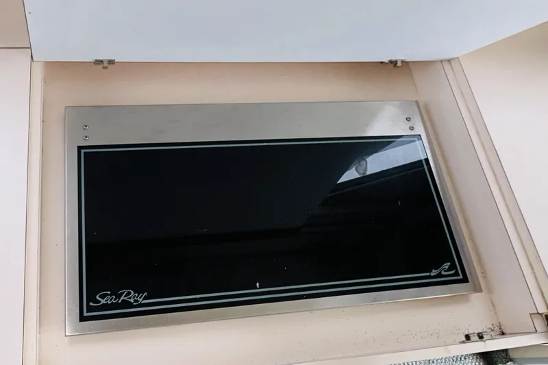 Slide: The Image of Control panel on a 1988 Sea Ray 265 Sedan Bridge boat. - 13