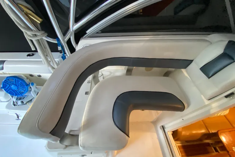 Slide: The Image of 2009 Century 3200 Offshore boat interior with white and black seating. - 23
