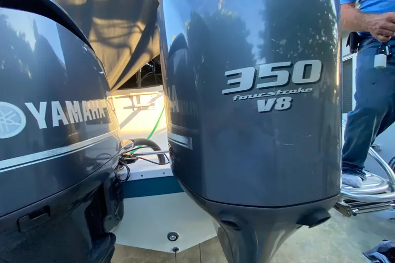 Slide: The Image of Yamaha 350 V8 four-stroke outboard engines on a 2009 Century 3200 Offshore boat. - 42