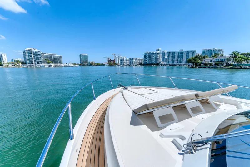 Slide: The Image of Luxury yacht Absolute 40 STL cruising near waterfront cityscape, 2017 model. - 17