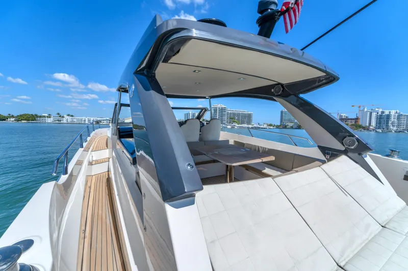 Slide: The Image of Luxurious 2017 Absolute 40 STL yacht with sleek design, docked by waterfront cityscape. - 22