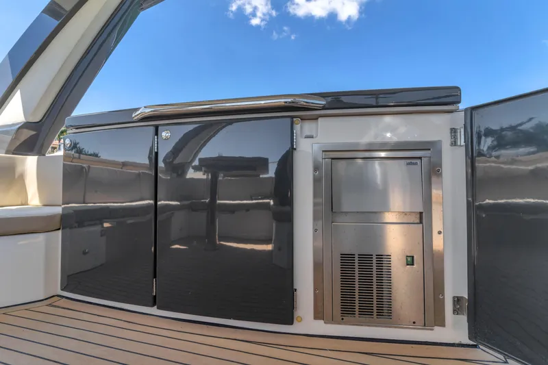 Slide: The Image of Outdoor kitchen area on a 2017 Absolute 40 STL yacht with stainless steel appliances. - 40