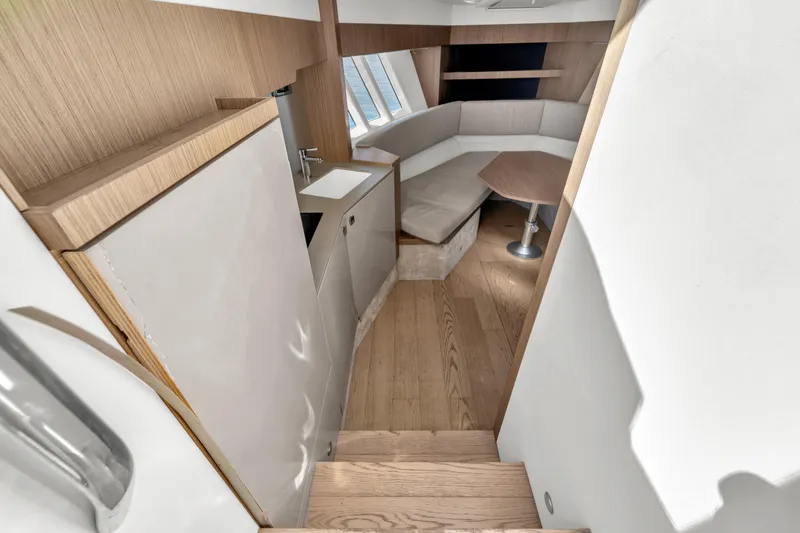 Slide: The Image of Interior of 2017 Absolute 40 STL yacht with modern wood finishes and seating area. - 41