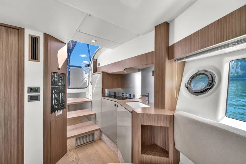 Slide: The Image of Interior of 2017 Absolute 40 STL yacht with modern kitchen and wooden accents. - 45