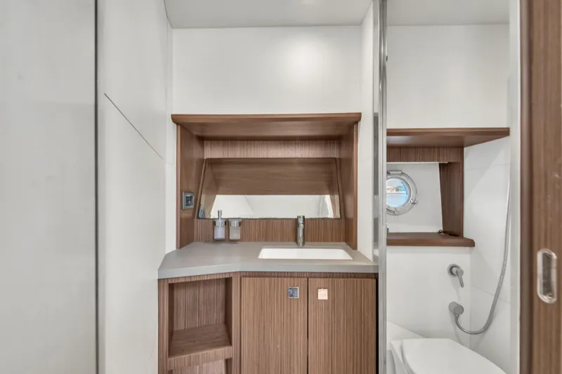 Slide: The Image of Luxurious bathroom interior of 2017 Absolute 40 STL yacht with modern wood accents. - 52