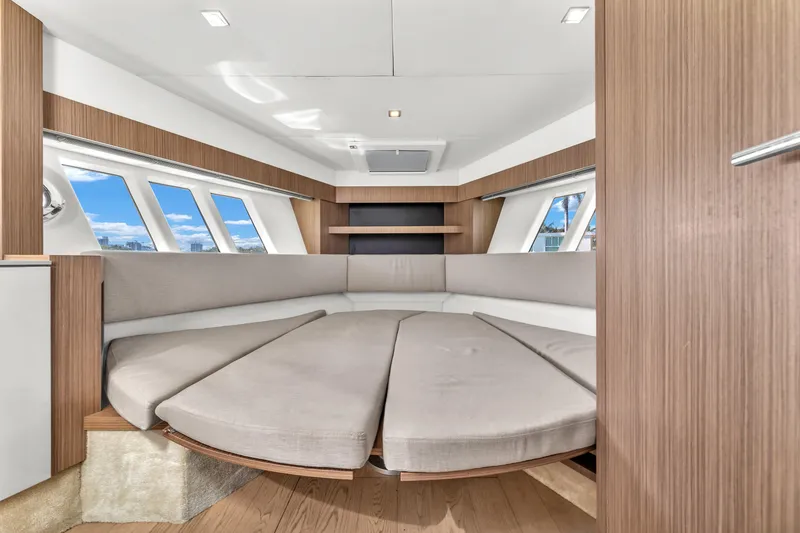 Slide: The Image of Luxurious interior of 2017 Absolute 40 STL yacht with modern seating and large windows. - 54