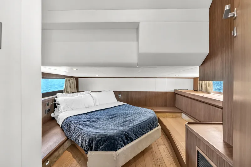 Slide: The Image of Luxurious cabin interior of 2017 Absolute 40 STL yacht with cozy bed and wooden accents. - 57