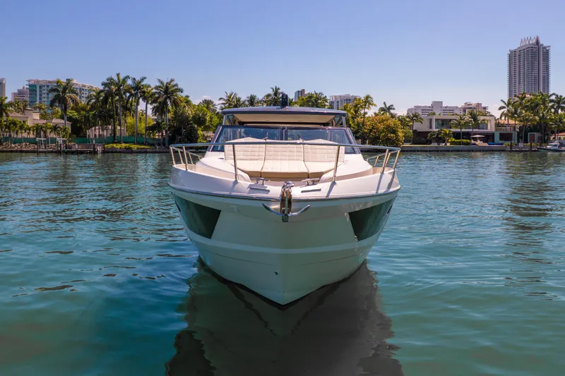 Slide: The Image of Front view of a 2017 Absolute 40 STL yacht on calm water. - 68