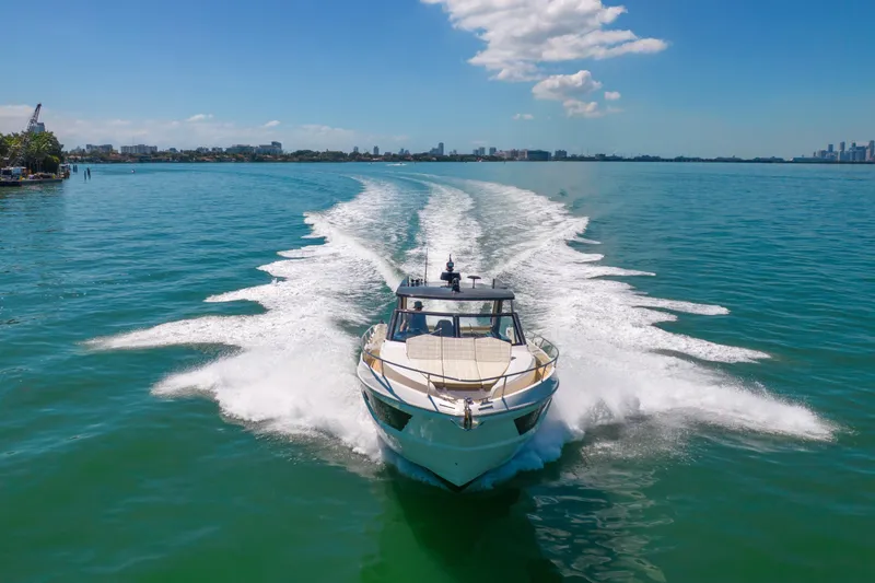 Slide: The Image of Luxury Absolute 40 STL yacht cruising on clear blue water, 2017 model. - 81