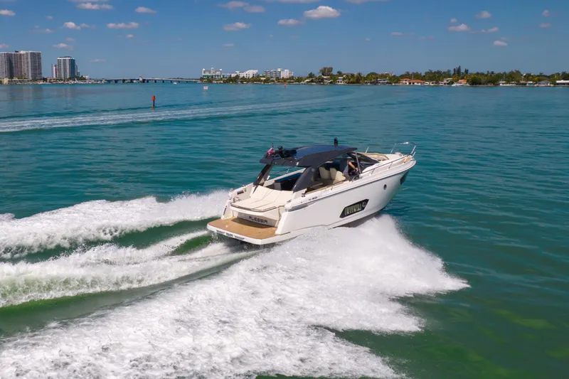 Slide: The Image of Luxury Absolute 40 STL yacht cruising on clear blue waters, 2017 model. - 85