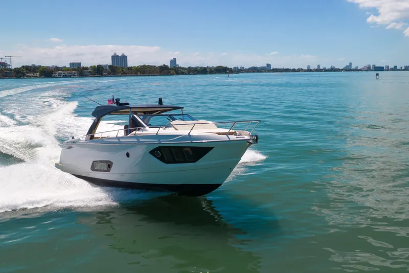 Slide: The Image of 2017 Absolute 40 STL yacht cruising on a sunny day in clear blue waters. - 88