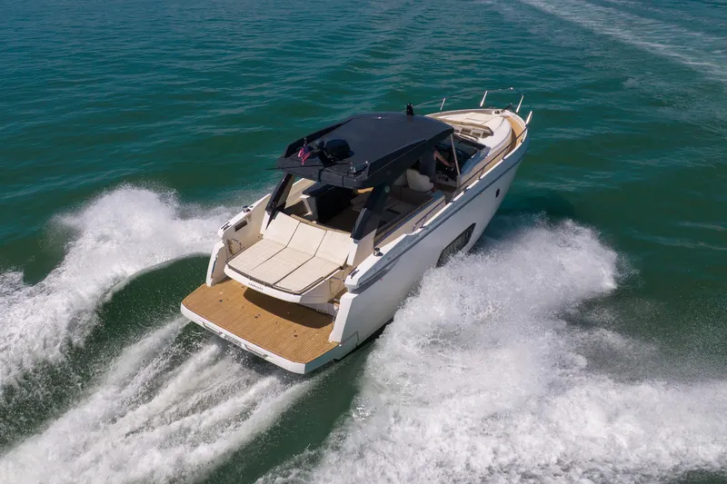 Slide: The Image of Luxury 2017 Absolute 40 STL yacht cruising on open water, showcasing sleek design and performance. - 89