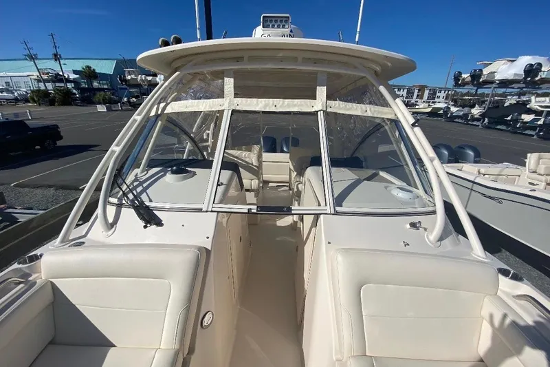 Slide: The Image of 2020 Grady-White Freedom 285 boat with spacious seating and clear windshield. - 7